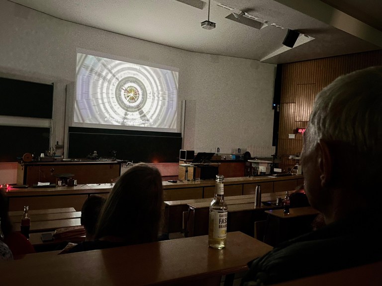 Cinema event on the evening of particle world showing the film Particle Fever in the Wolfgang-Paul lecture hall